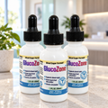 GlucoZone 3-bottle package arranged on a light counter in a bright clinic-inspired setting.