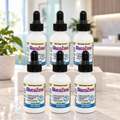 GlucoZone 6-bottle package arranged on a light counter in a bright clinic-inspired setting.